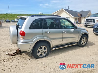 Trzecie zdjęcie samochodu z tyłu: 2003 TOYOTA RAV4 BASE VIN:JTEHH20V636077892 - miniatura