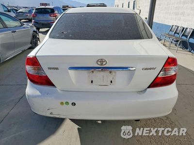Zdjęcie 6 z 12 samochodu: 2004 TOYOTA CAMRY LE VIN:JTDBE32K440265374 - miniatura