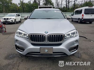 Piąte zdjęcie samochodu w środku: 2019 BMW X6 XDRIVE35I VIN:5UXKU2C54K0Z64716 - miniatura