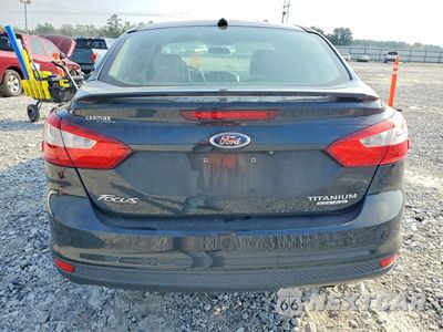 Zdjęcie 6 z 12 samochodu: 2014 FORD FOCUS TITANIUM VIN:1FADP3J25EL406642 - miniatura