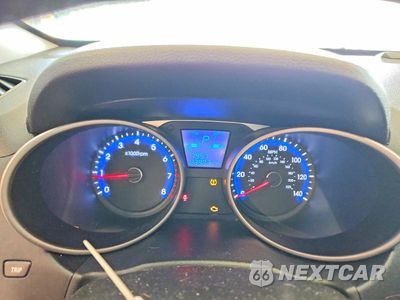 Zdjęcie 9 z 13 samochodu: 2013 HYUNDAI TUCSON LIMITED VIN:KM8JUCAC8DU745141 - miniatura