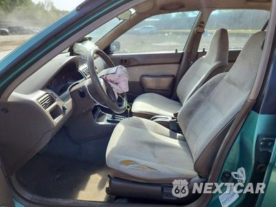 Zdjęcie 7 z 12 samochodu: 1995 TOYOTA TERCEL DX VIN:JT2EL56E9S7001115 - miniatura