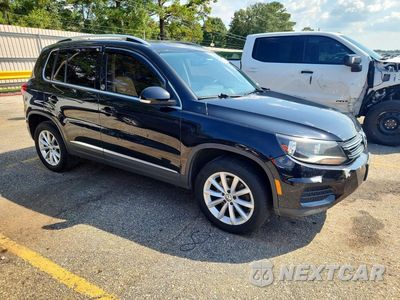 Czwarte zdjęcie samochodu z boku: 2017 VOLKSWAGEN TIGUAN WOLFSBURG VIN:WVGSV7AX0HK005516 - miniatura