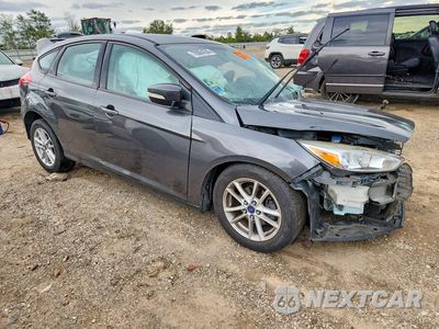 Czwarte zdjęcie samochodu z boku: 2017 FORD FOCUS SE VIN:1FADP3K22HL302564 - miniatura