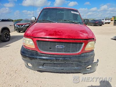 Piąte zdjęcie samochodu w środku: 2000 FORD F150 VIN:1FTZF0720YKA85550 - miniatura