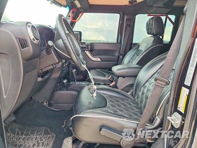 Zdjęcie 7 z 13 samochodu: 2015 JEEP WRANGLER UNLIMITED SAHARA VIN:1C4BJWEG9FL648605 - miniatura