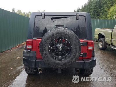Zdjęcie 6 z 13 samochodu: 2012 JEEP WRANGLER UNLIMITED RUBICON VIN:1C4BJWFG0CL109493 - miniatura