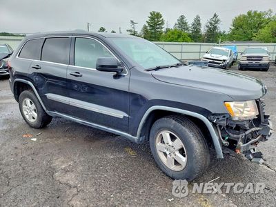 Czwarte zdjęcie samochodu z boku: 2012 JEEP GRAND CHEROKEE LAREDO VIN:1C4RJFAGXCC155113 - miniatura