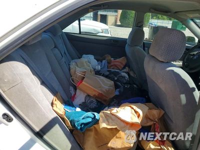 Zdjęcie 10 z 12 samochodu: 2003 TOYOTA CAMRY LE VIN:4T1BE32KX3U173480 - miniatura