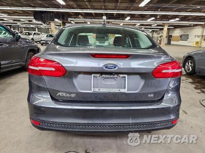 Zdjęcie 6 z 13 samochodu: 2018 FORD FOCUS SE VIN:1FADP3F28JL251670 - miniatura