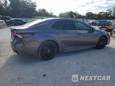 Trzecie zdjęcie samochodu z tyłu: 2024 TOYOTA CAMRY XSE VIN:4T1K61AK5RU878666 - miniatura