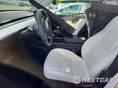 Zdjęcie 7 z 14 samochodu: 2022 TESLA MODEL Y VIN:7SAYGDEE4NF391210 - miniatura