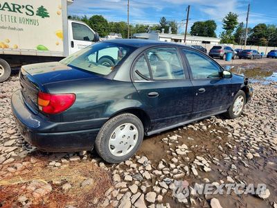 Trzecie zdjęcie samochodu z tyłu: 2002 SATURN SL1 VIN:1G8ZH52832Z157157 - miniatura
