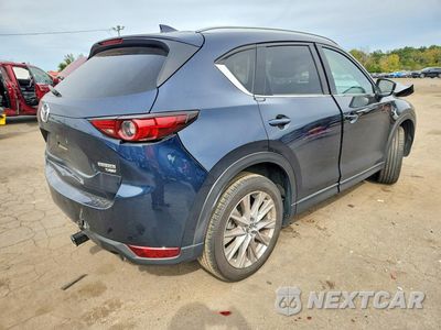 Trzecie zdjęcie samochodu z tyłu: 2021 MAZDA CX-5 GRAND TOURING RESERVE VIN:JM3KFBAY3M0381962 - miniatura