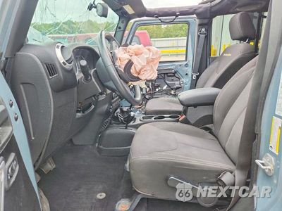 Zdjęcie 7 z 14 samochodu: 2014 JEEP WRANGLER UNLIMITED SAHARA VIN:1C4BJWEG8EL313382 - miniatura