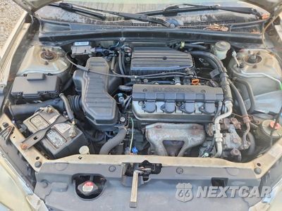 Zdjęcie 11 z 12 samochodu: 2004 HONDA CIVIC LX VIN:1HGEM225X4L009177 - miniatura
