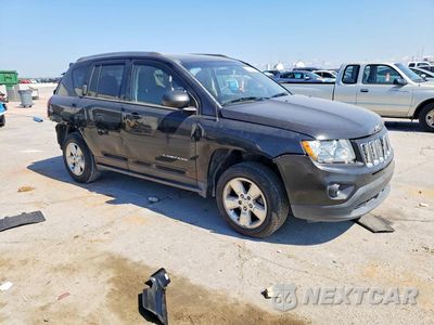 Czwarte zdjęcie samochodu z boku: 2014 JEEP COMPASS SPORT VIN:1C4NJCBAXED908692 - miniatura