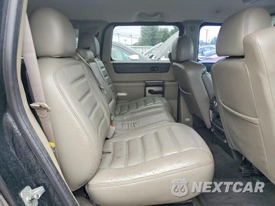 Zdjęcie 11 z 13 samochodu: 2004 HUMMER H2 VIN:5GRGN23U24H100200 - miniatura
