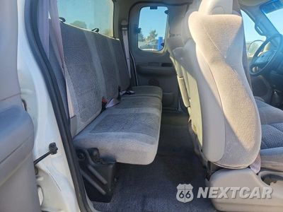 Zdjęcie 10 z 12 samochodu: 2002 FORD F150 VIN:1FTRX17L42NA70504 - miniatura