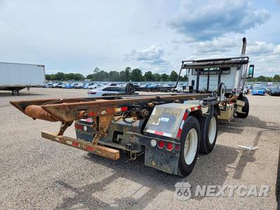 Trzecie zdjęcie samochodu z tyłu: 2022 INTERNATIONAL HX620 ROLL-OFF CONTAINER TRUCK VIN:3HTPCAPT9NN138729 - miniatura