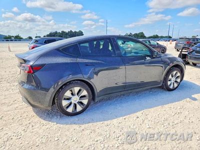 Trzecie zdjęcie samochodu z tyłu: 2024 TESLA MODEL Y VIN:7SAYGDED4RF018505 - miniatura