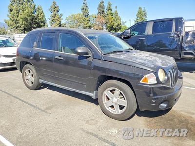Czwarte zdjęcie samochodu z boku: 2009 JEEP COMPASS SPORT VIN:1J4FT47B29D221289 - miniatura