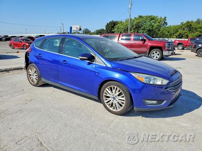 Czwarte zdjęcie samochodu z boku: 2015 FORD FOCUS TITANIUM VIN:1FADP3N20FL369723 - miniatura