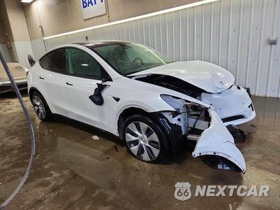 Czwarte zdjęcie samochodu z boku: 2023 TESLA MODEL Y VIN:7SAYGDEE7PF755574 - miniatura