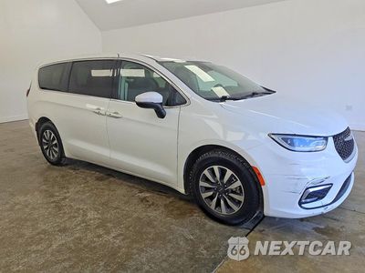 Czwarte zdjęcie samochodu z boku: 2023 CHRYSLER PACIFICA HYBRID TOURING L VIN:2C4RC1L78PR611858 - miniatura