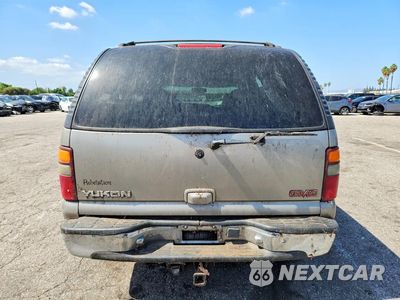Zdjęcie 6 z 13 samochodu: 2001 GMC YUKON VIN:1GKEC13T81R210145 - miniatura