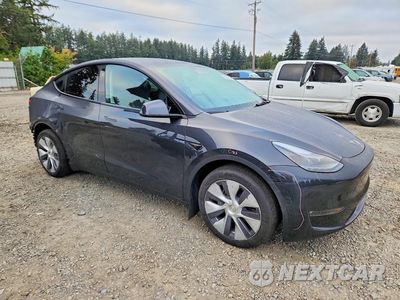 Czwarte zdjęcie samochodu z boku: 2024 TESLA MODEL Y VIN:7SAYGAEE4RF986398 - miniatura