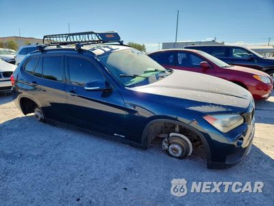 Czwarte zdjęcie samochodu z boku: 2014 BMW X1 SDRIVE28I VIN:WBAVM1C58EVW54615 - miniatura