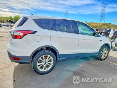 Trzecie zdjęcie samochodu z tyłu: 2017 FORD ESCAPE SE VIN:1FMCU9GD9HUC34474 - miniatura