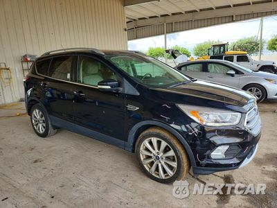 Czwarte zdjęcie samochodu z boku: 2017 FORD ESCAPE TITANIUM VIN:1FMCU0JD1HUC73287 - miniatura