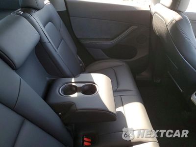 Zdjęcie 10 z 12 samochodu: 2024 TESLA MODEL Y VIN:7SAYGDEF1RA318131 - miniatura