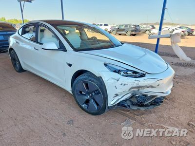 Czwarte zdjęcie samochodu z boku: 2023 TESLA MODEL 3 VIN:5YJ3E1EA9PF692650 - miniatura