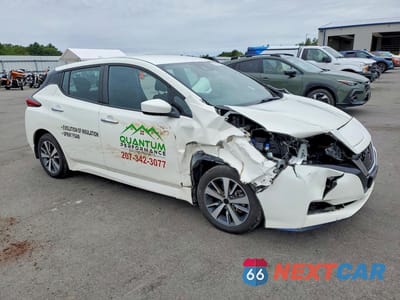 Czwarte zdjęcie samochodu z boku: 2021 NISSAN LEAF S PLUS VIN:1N4BZ1BVXMC556422 - miniatura