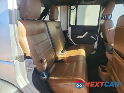 Zdjęcie 10 z 12 samochodu: 2012 JEEP WRANGLER UNLIMITED RUBICON VIN:1C4HJWFG5CL125375 - miniatura