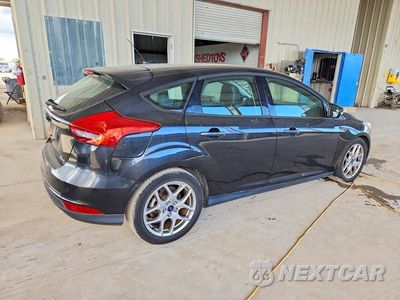 Trzecie zdjęcie samochodu z tyłu: 2015 FORD FOCUS SE VIN:1FADP3K2XFL345515 - miniatura
