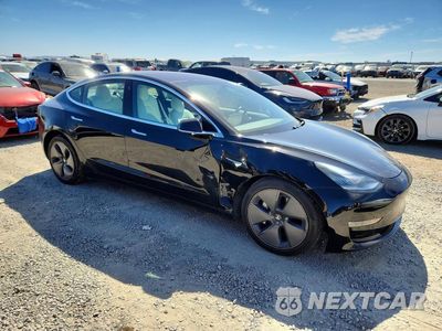 Czwarte zdjęcie samochodu z boku: 2018 TESLA MODEL 3 VIN:5YJ3E1EA5JF166426 - miniatura