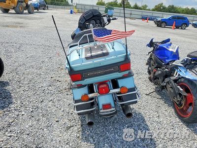 Czwarte zdjęcie samochodu z boku: 2007 HARLEY-DAVIDSON FLHTCUI VIN:1HD1FC41X7Y610294 - miniatura