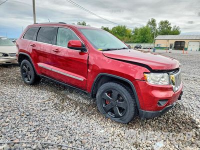 Czwarte zdjęcie samochodu z boku: 2013 JEEP GRAND CHEROKEE LAREDO VIN:1C4RJFAG3DC502721 - miniatura