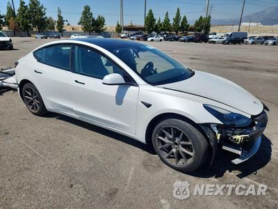 Czwarte zdjęcie samochodu z boku: 2023 TESLA MODEL 3 VIN:5YJ3E1EA7PF516339 - miniatura