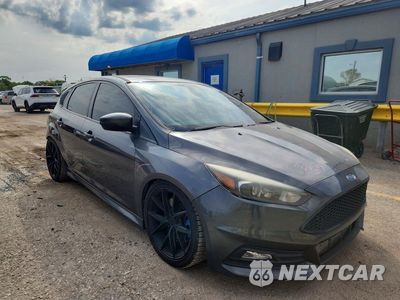 Czwarte zdjęcie samochodu z boku: 2018 FORD FOCUS VIN:1FADP3L92JL229780 - miniatura