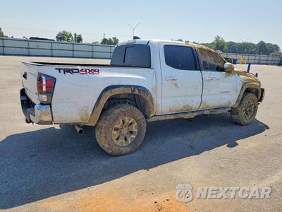 Trzecie zdjęcie samochodu z tyłu: 2023 TOYOTA TACOMA TRD OFF-ROAD VIN:3TMCZ5AN1PM614086 - miniatura