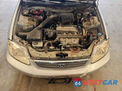 Zdjęcie 11 z 12 samochodu: 1999 HONDA CIVIC BASE VIN:2HGEJ6610XH595591 - miniatura