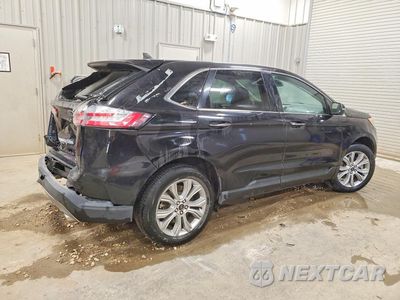 Trzecie zdjęcie samochodu z tyłu: 2022 FORD EDGE TITANIUM VIN:2FMPK4K92NBA52095 - miniatura