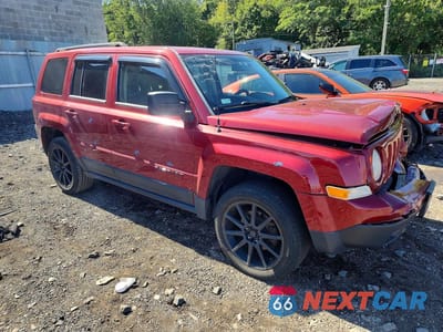 Czwarte zdjęcie samochodu z boku: 2014 JEEP PATRIOT SPORT VIN:1C4NJRBB7ED533694 - miniatura