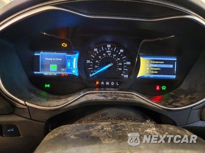 Zdjęcie 9 z 12 samochodu: 2014 FORD FUSION TITANIUM HEV VIN:3FA6P0RU6ER393284 - miniatura