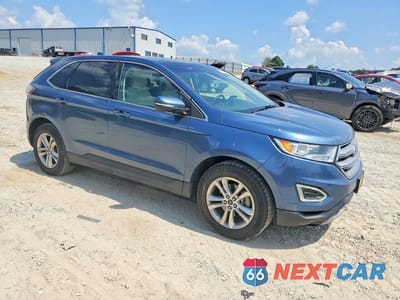 Czwarte zdjęcie samochodu z boku: 2018 FORD EDGE SEL VIN:2FMPK3J97JBC04703 - miniatura